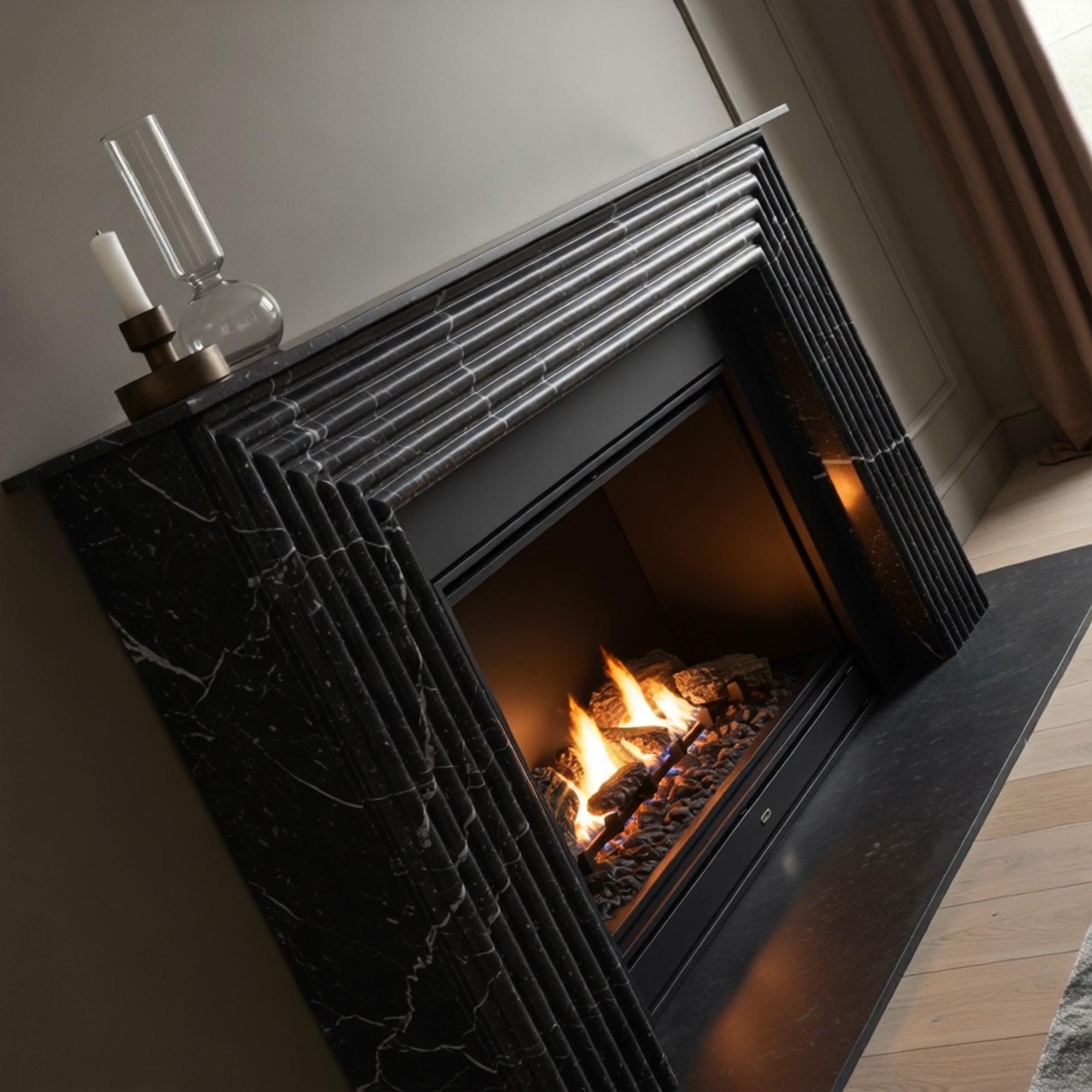 Art Deco inspired black marble mantel with sculpted fluting, adding drama and style to any room