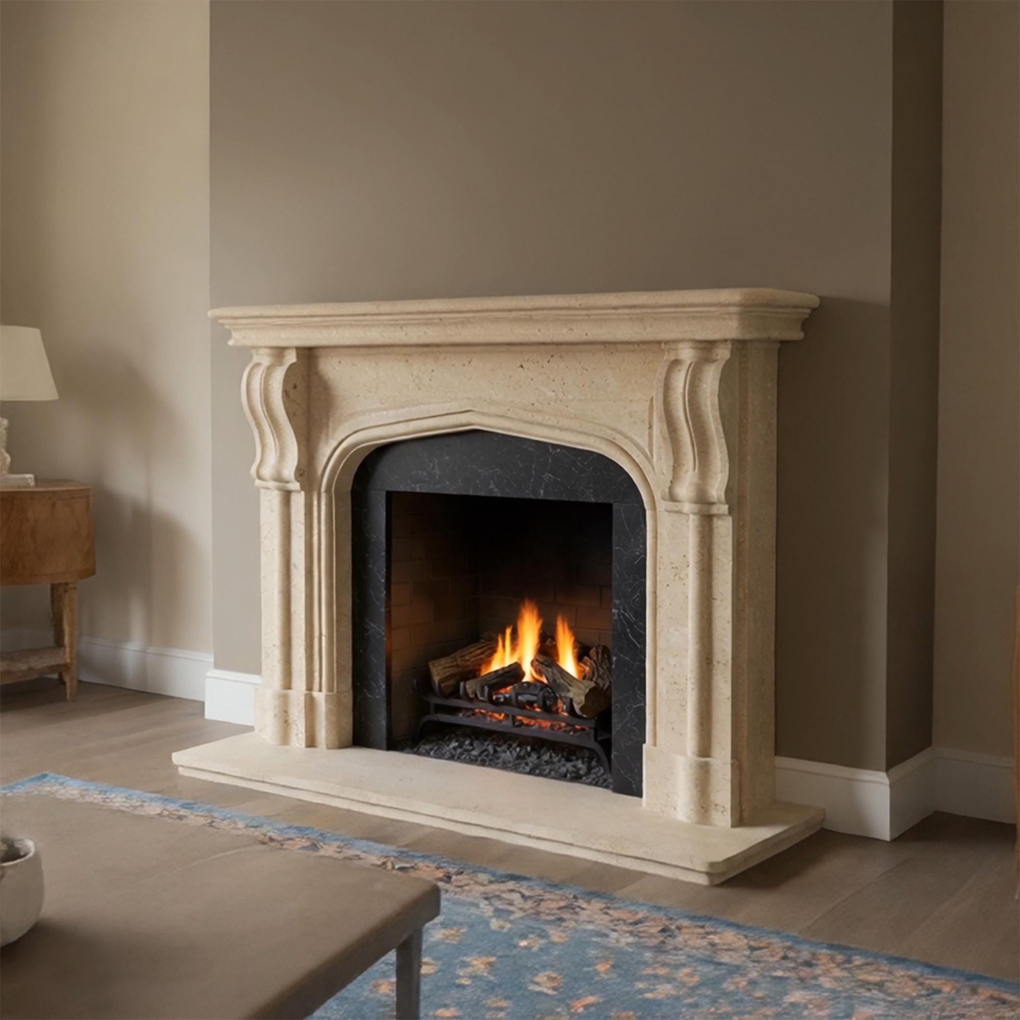 Bespoke fireplace surround in beige marble with graceful arches and timeless styling