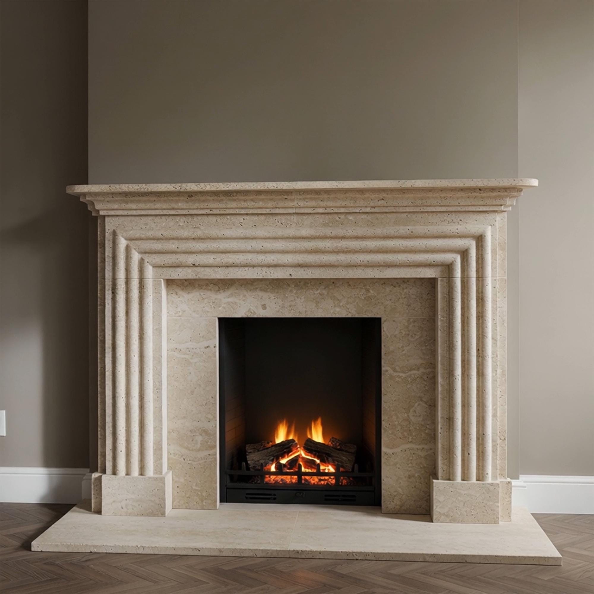 Elegant beige marble fireplace with sculpted fluting and a multi-level layered surround