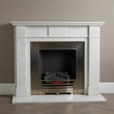 Handcrafted Carrara marble fireplace mantel with clean lines and classic white stone finish