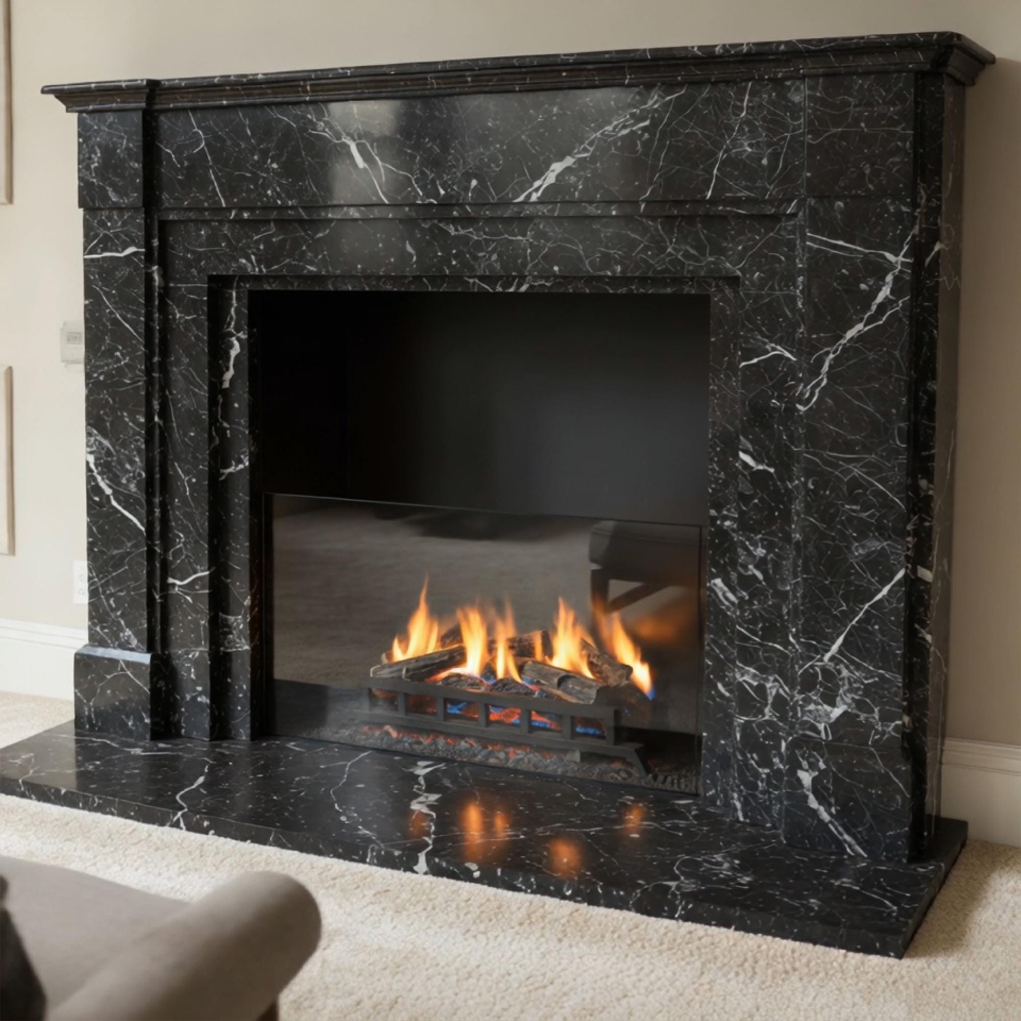 Traditional black marble mantel surrounding a modern firebox, set in a cozy living room