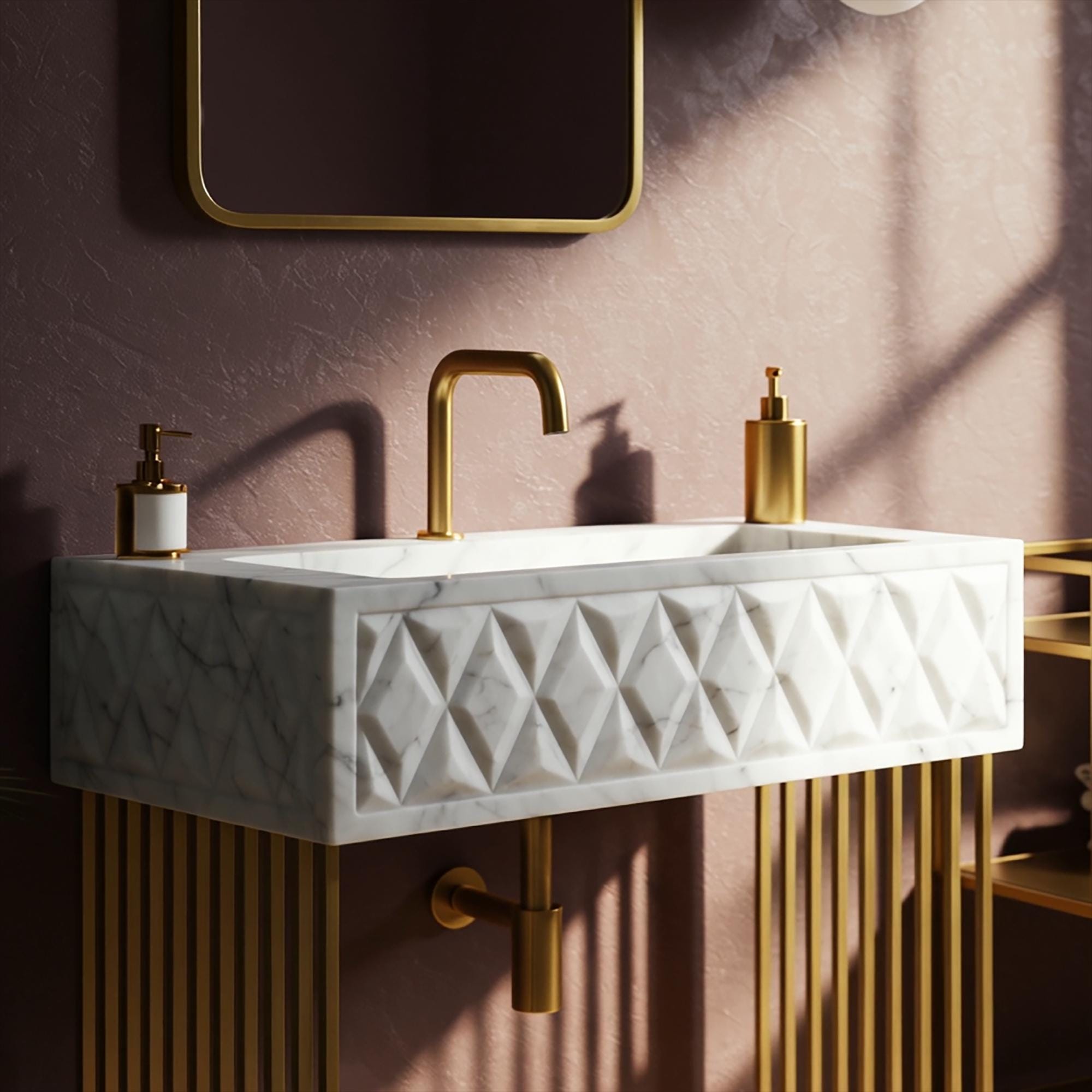 Hand-sculpted Carrara marble vanity with diamond-cut surface and brass fixtures