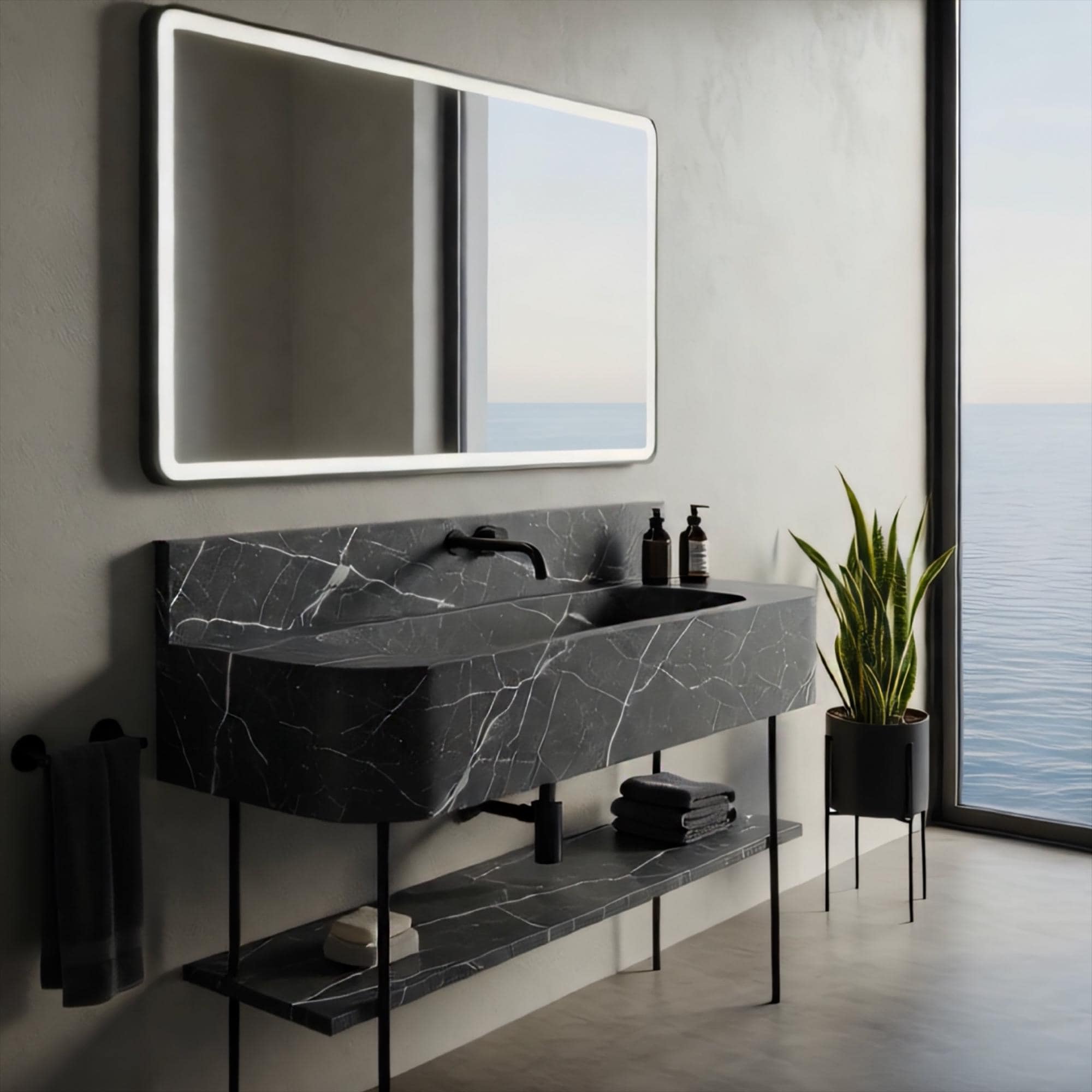 Sleek floating sink in Pietre Notte marble with minimalist metal supports and shelf