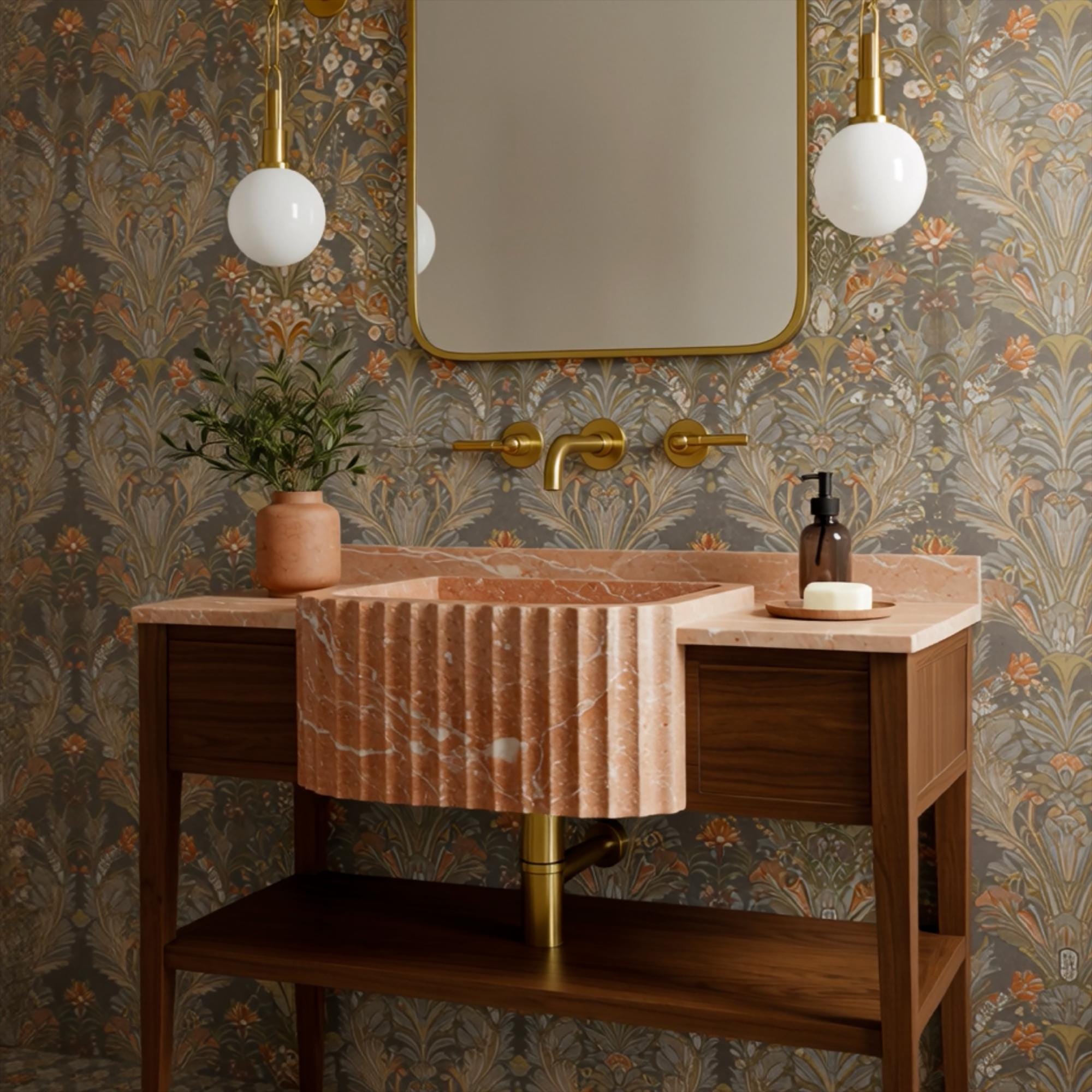 Sculpted marble sink with dramatic fluted apron integrated into custom walnut console vanity