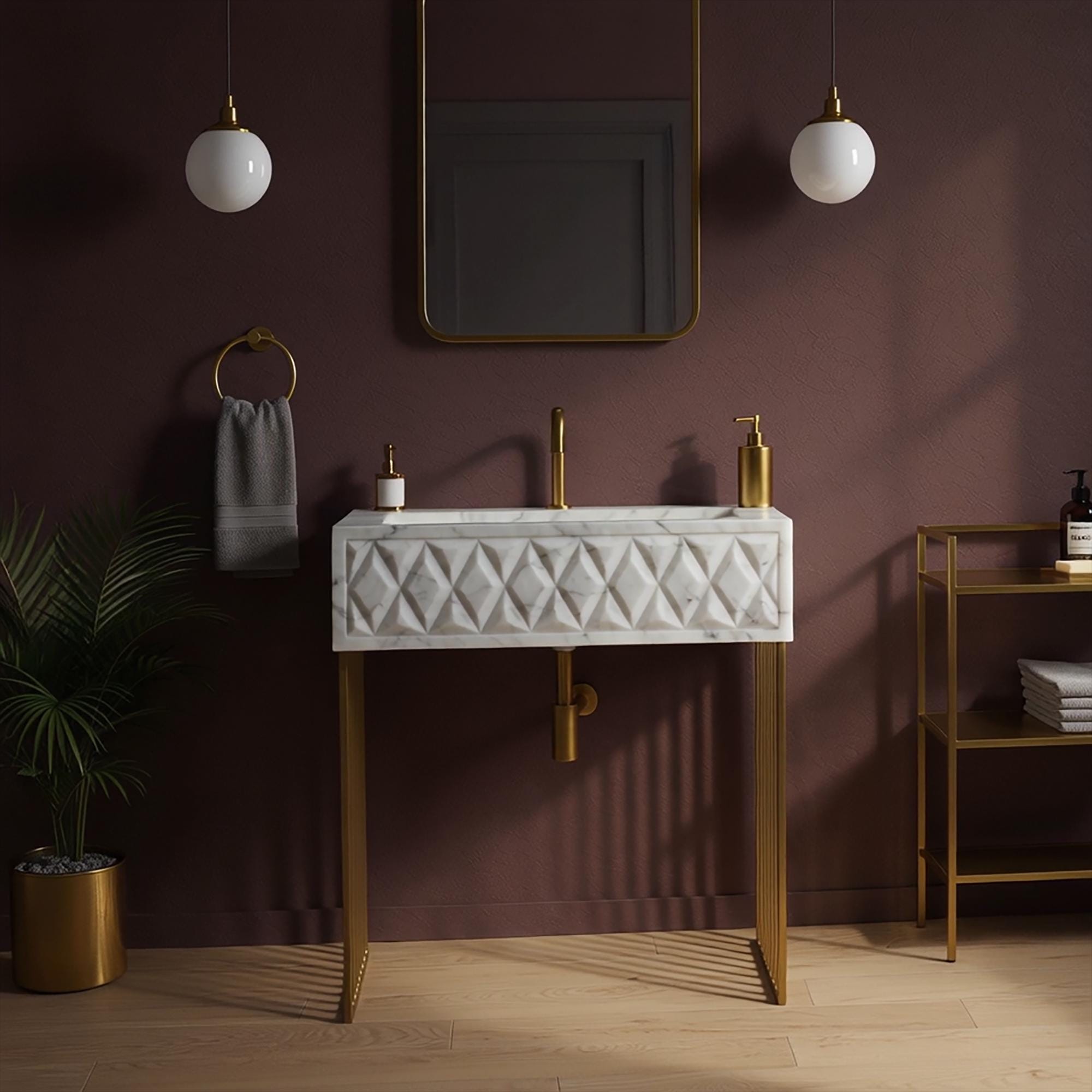 Faceted Carrara marble sink with angular detail and gold frame, styled in a high-end bathroom interior