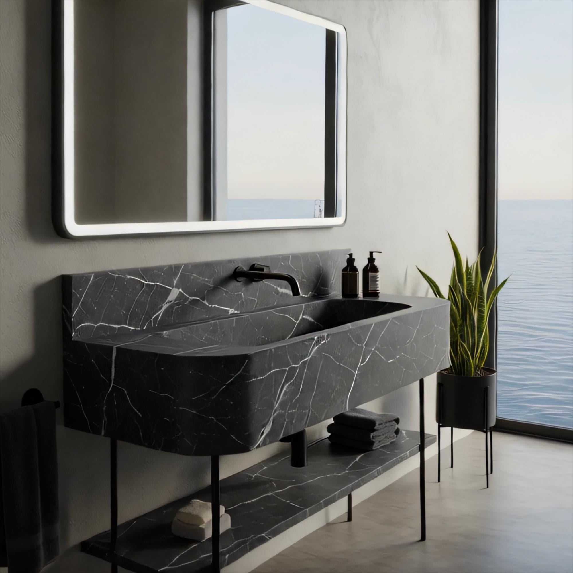 Wall-mounted console vanity in Pietre Notte marble featuring clean lines and a lower storage shelf
