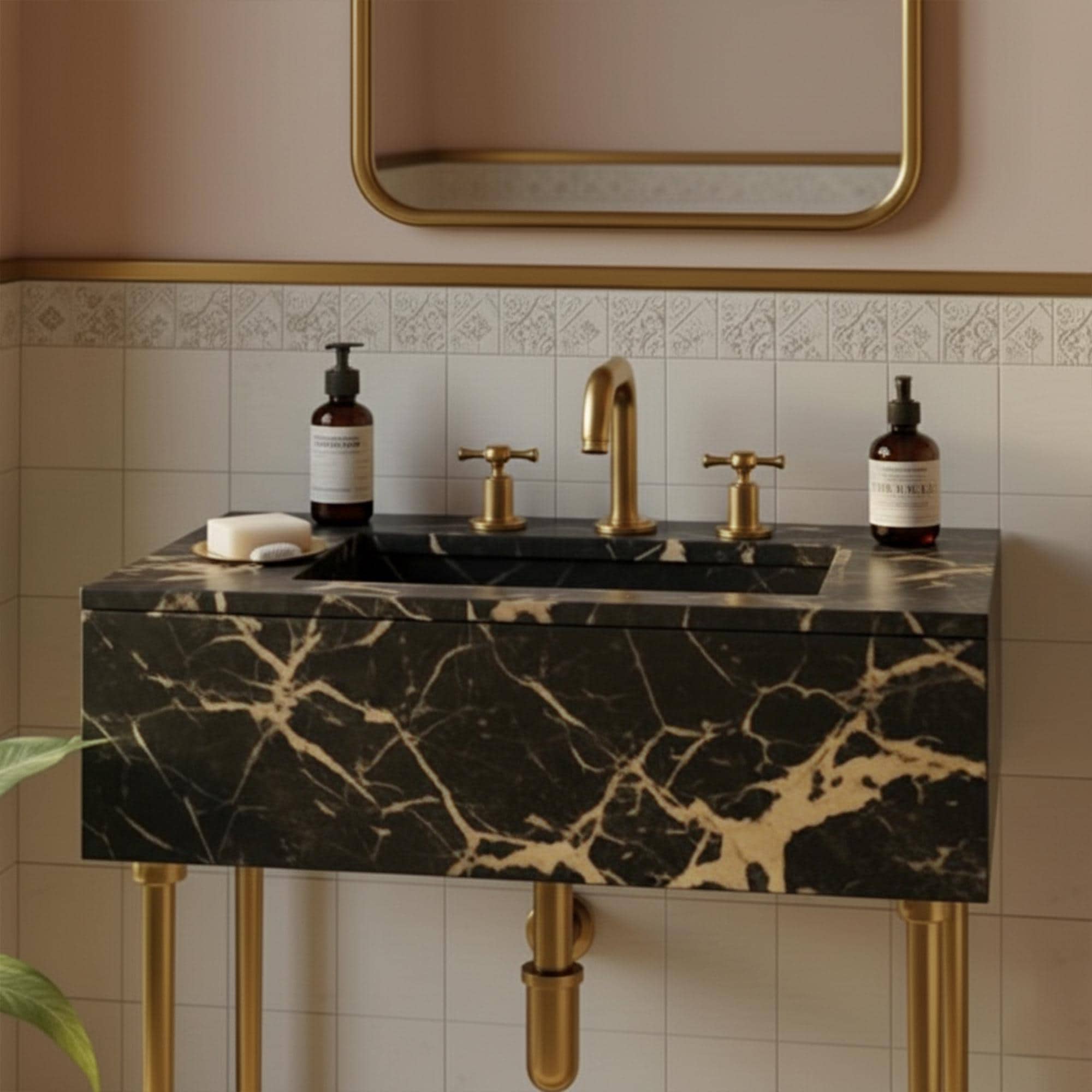 Handcrafted black Picasso marble bathroom sink with integrated basin and polished brass leg support
