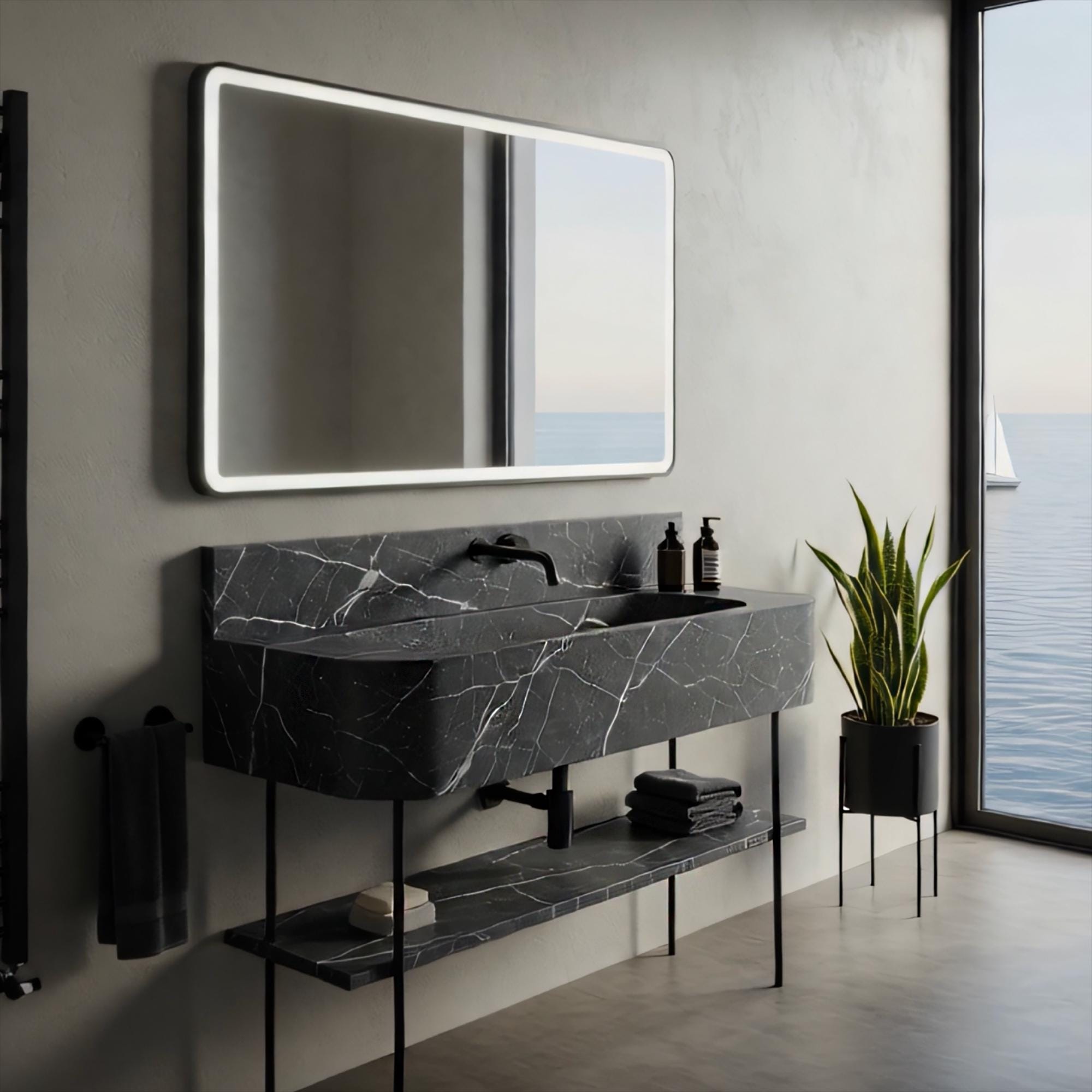 Contemporary black marble sink with integrated shelf and matte black fixtures