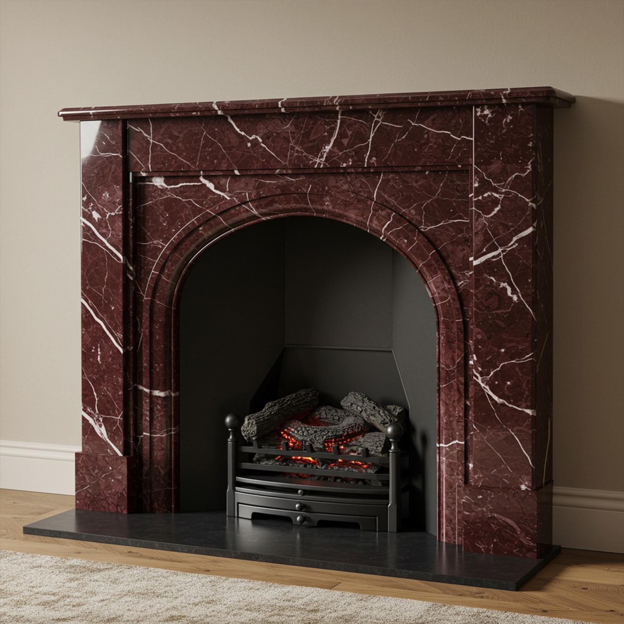 Elegant Rosso Levanto cherry marble fireplace mantel featuring a rounded arch and bold veining